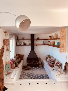 Cosy fireplace nook with built-in seating